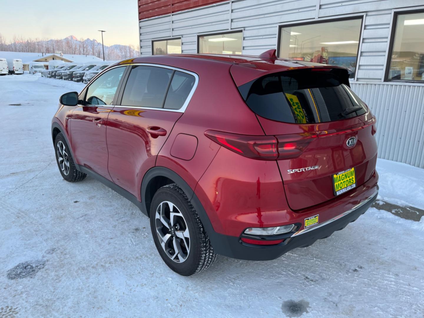 2021 Red /black Kia Sportage LX AWD (KNDPMCAC8M7) with an 2.4L V6 DOHC 24V engine, 6A transmission, located at 1960 Industrial Drive, Wasilla, 99654, (907) 274-2277, 61.573475, -149.400146 - Photo#3